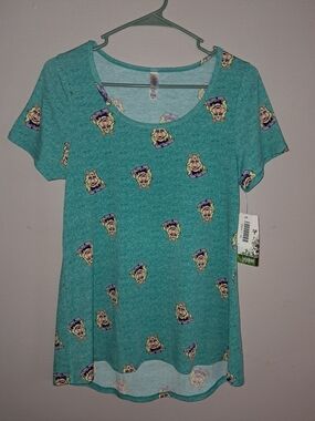 LuLaRoe NWT Teal Short Sleeve Top with Yellow & Purple Cartoon Miss Piggy